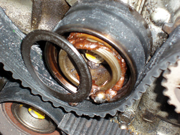 This failed timing belt idler pulley illustrates why customers should be sold a timing belt installation kit, rather than just a timing belt. 