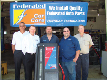 From left, Phil Moore, senior vice president, Federated Auto Parts; Steve Horn, vice president of sales, ATP; George McGarvey, owner, George’s Auto Repair; Kevin Smaby, United Auto Supply; Bob Allen, district manager, ATP.