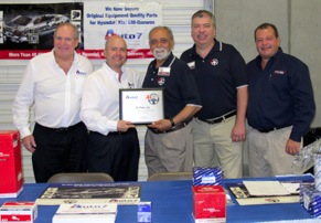 Auto 7 president Steven Kruss presents the company’s 2012 Distributor of the Year Award to XL Parts president Ali Attayi and vice president supply chain Mike Thompson at XL Parts’ annual Customer Open House held April 7, 2013 in Houston, TX. Kruss commended XL Parts for promoting awareness of Auto 7’s OEM quality parts for Hyundai, Kia and GM-Daewoo, as well as providing excellent customer service to installers. Joining Kruss in presenting the award is Auto 7 senior vice president Jim Murphey, far left, and business development manager Joe Sotolongo, far right.