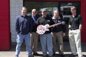 Left to right: Mike Smith (store manager), Bob Deming (UCI Warehouse general manager), Brian Hunt, John Edlund (NGK district manager) and Mike Kasel (Advantage Auto Store district manager)