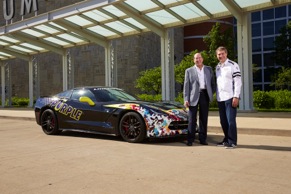 Royal Purple President Bryan Yourdon, Royal Purple sponsored driver Townsend Bell and Lingenfelter Performance Engineering CEO/owner Ken Lingenfelter with a specially wrapped Lingenfelter C7 Corvette at the 2014 Indianapolis 500.